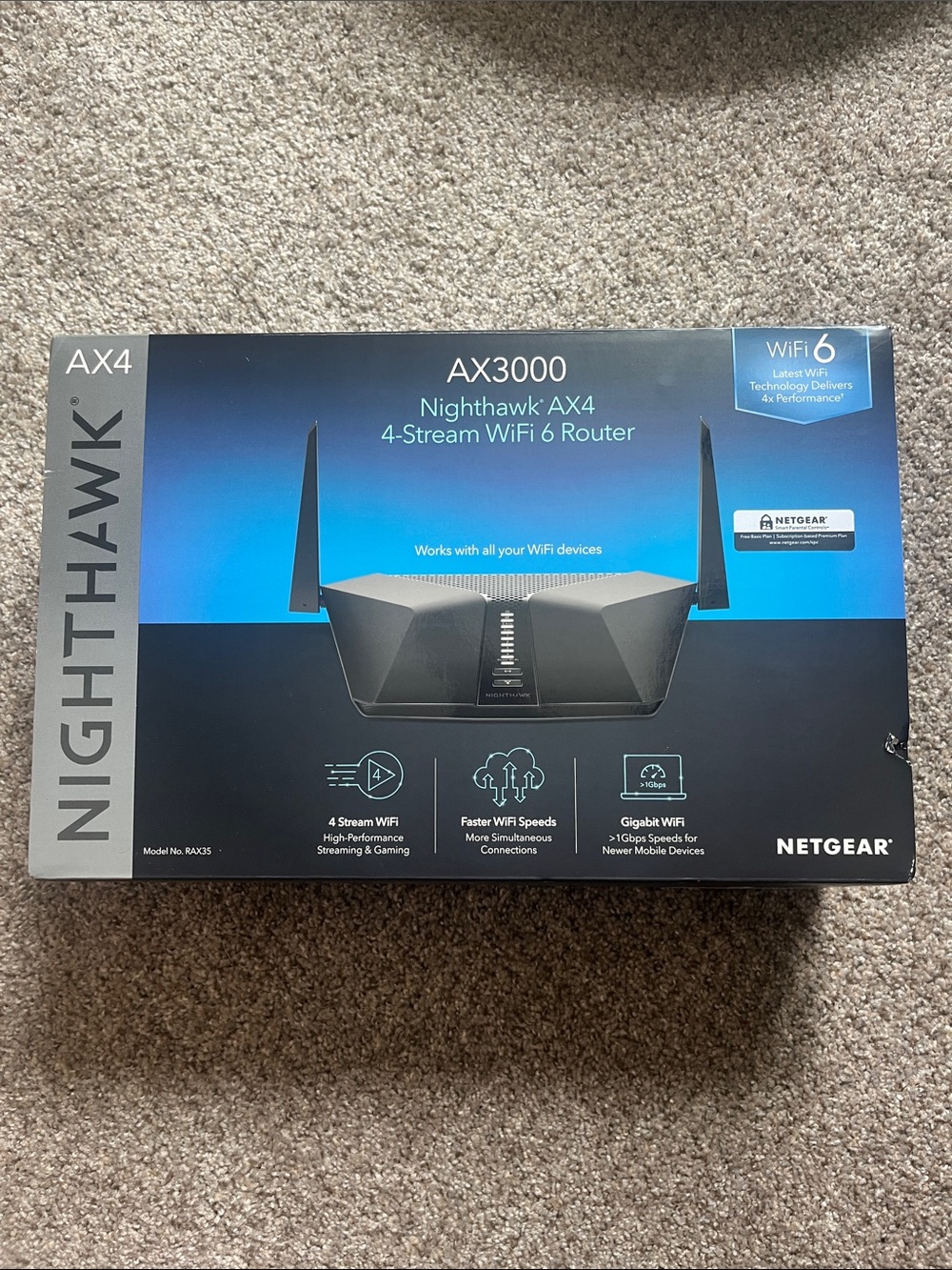 NETGEAR Nighthawk AX3000 AX4 Router - Black and Blue Box Artwork